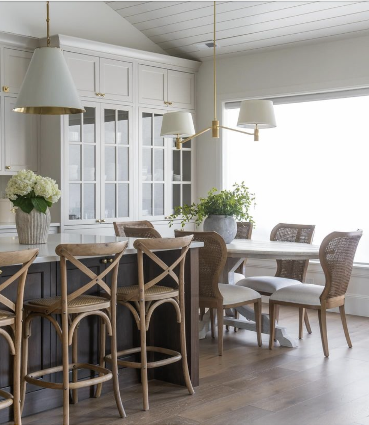 a neutral kitchen and breakfast nook work to create a welcoming space 