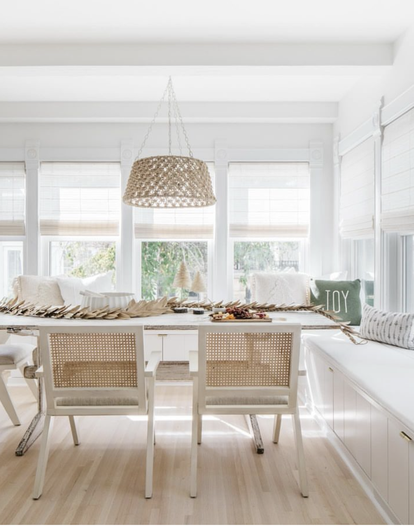 Kate Marker Interiors Breakfast Nook is so beautiful with the wicker light fixture and light and airy space