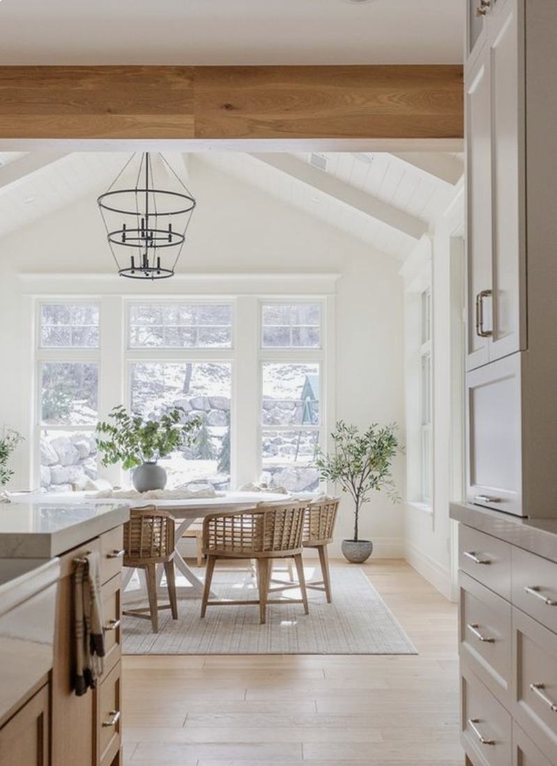 This breakfast nook is so inviting. The vaulted ceiling makes it feel more spacious, the chairs are sturdy and slightly oversized and the round table makes everyone feel like they have the talking stick.