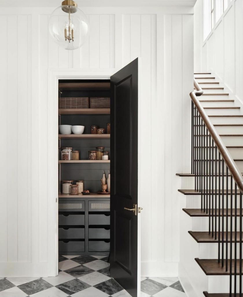 Pantries and Sculleries that we love can be big or small, we are loving this black pantry with the classic black and white tile!