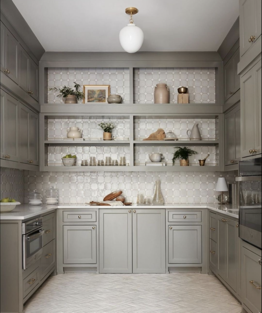 A neutral pallet makes this space as beautiful as it is functional. We love that tile!  We love beautiful sculleries and pantries! 
