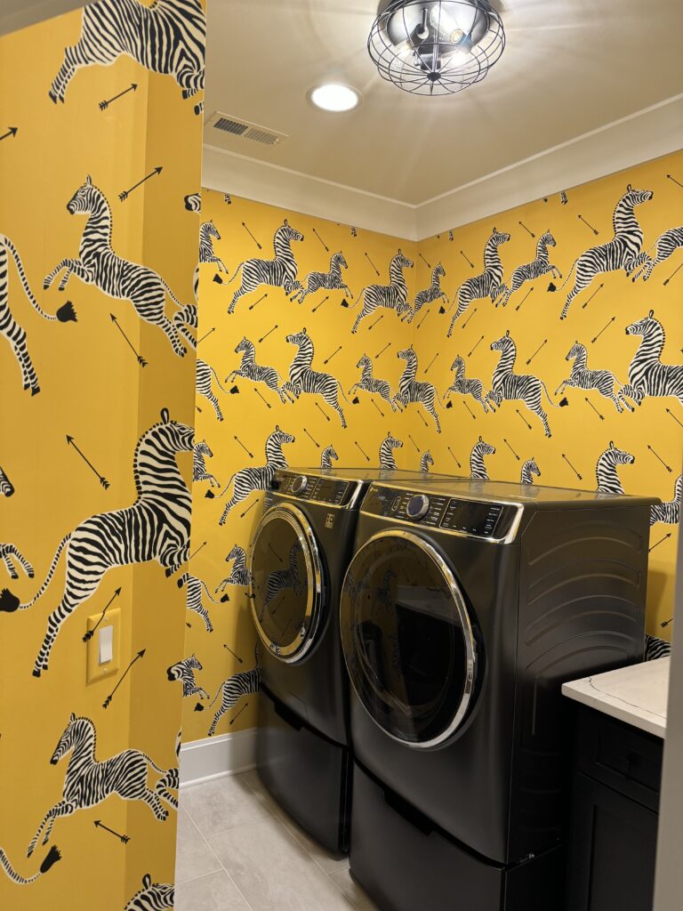 If you have to do the chores, why not make the laundry room fun with happy zebras drom scalamandre and Sutton Place Design and Build 