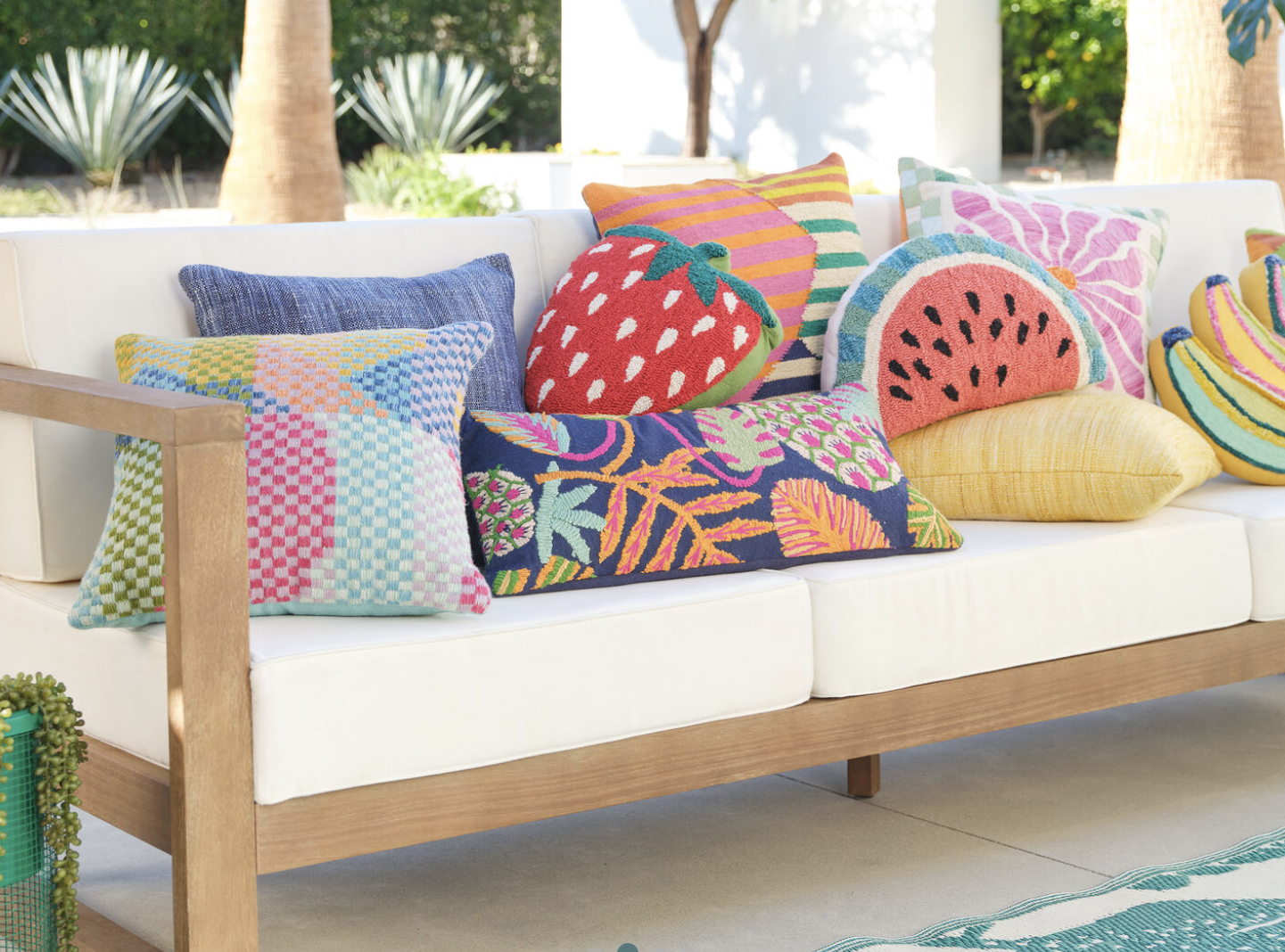 Fun outdoor pillows and cushions give off a happy vibe without worrying if rain or spills happen. interior designer and builder troutman nc