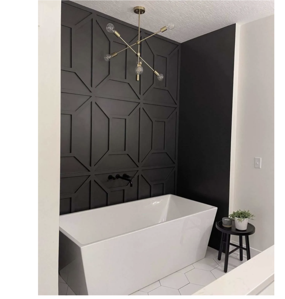 Black walls that replicate the hexagon tile pattern on the floor provide interest and create drama Sutton Place Custom Home Builder 