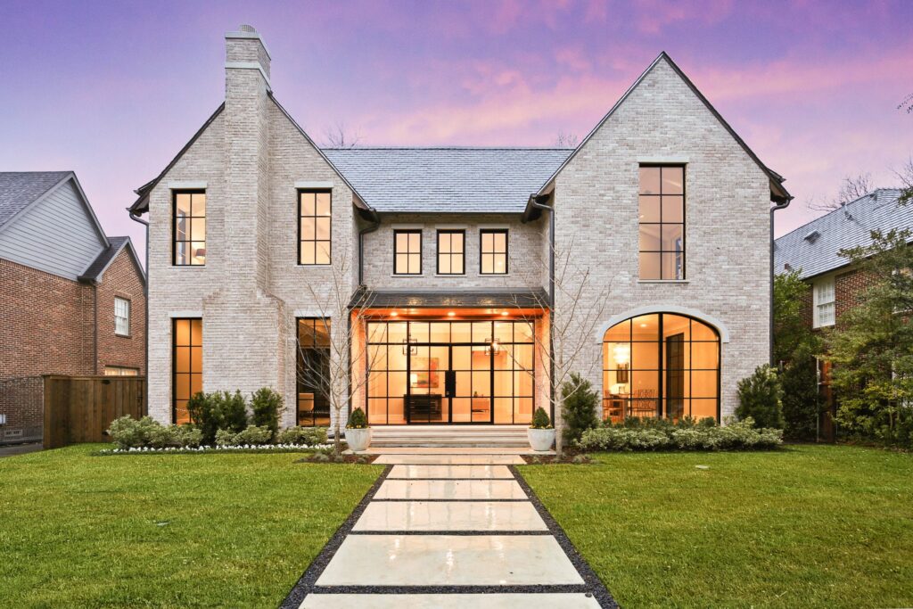 Image Suggestion: A house with a stone and wood exterior.Caption: Natural materials on the exterior reflect the organic modern style.
Alt Text: